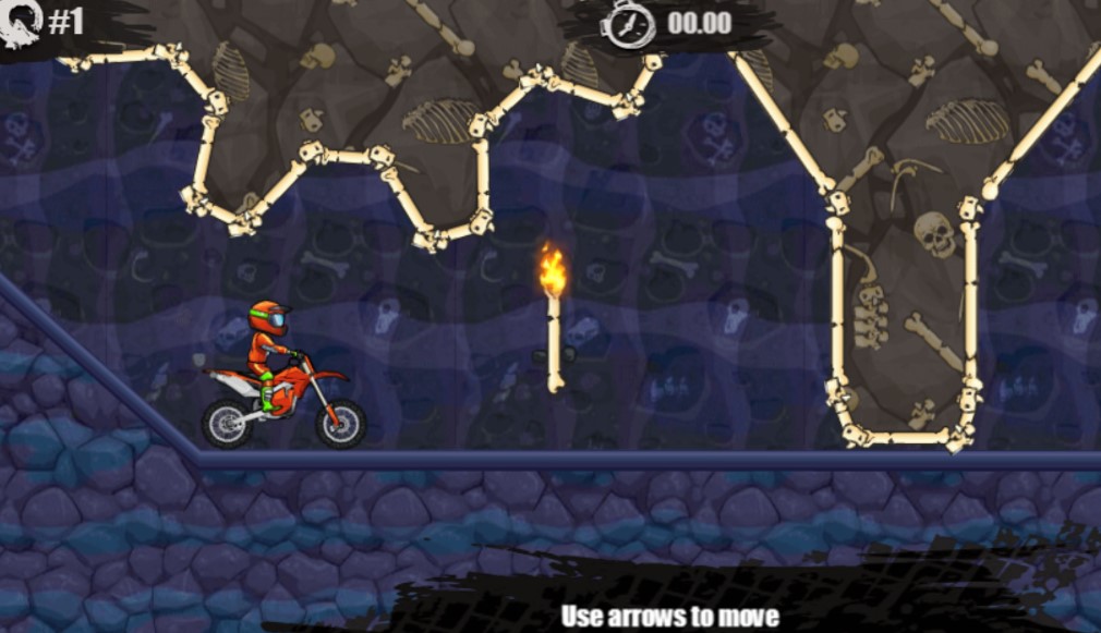 Player performing stunt jump over spikes in Moto X3M 6 Spooky Land level